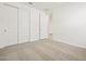 Bright bedroom featuring a closet with sliding doors at 4041 S 176Th Dr, Goodyear, AZ 85338