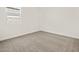 Bedroom featuring carpet and window at 4041 S 176Th Dr, Goodyear, AZ 85338