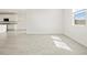 Bright and airy living room features tiled floors and windows offering natural light at 4041 S 176Th Dr, Goodyear, AZ 85338