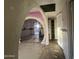 Open living space with arched entryways. Needs updating at 4400 N 20Th St, Phoenix, AZ 85016