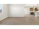 Open-concept living space with hardwood floors and a seamless transition to the kitchen area at 4822 N 177Th Ln, Goodyear, AZ 85395