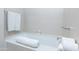 Relaxing bathtub with modern fixtures and bright lighting at 5455 E Lincoln Dr # 1001, Paradise Valley, AZ 85253