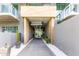 Modern building entrance with pathway at 5455 E Lincoln Dr # 1001, Paradise Valley, AZ 85253
