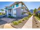 Modern building exterior with desert landscaping at 5455 E Lincoln Dr # 1001, Paradise Valley, AZ 85253
