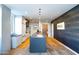 Modern kitchen with island and wood floors at 5455 E Lincoln Dr # 1001, Paradise Valley, AZ 85253