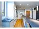 Modern kitchen with island and wood floors at 5455 E Lincoln Dr # 1001, Paradise Valley, AZ 85253