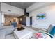 Modern living room with hardwood floors, open floor plan, and comfortable furniture at 5455 E Lincoln Dr # 1001, Paradise Valley, AZ 85253