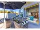 Private patio with seating area and fire pit at 5455 E Lincoln Dr # 1001, Paradise Valley, AZ 85253
