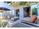 Private patio with fire pit and comfortable seating at 5455 E Lincoln Dr # 1001, Paradise Valley, AZ 85253