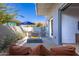 Private patio with fire pit and comfortable seating at 5455 E Lincoln Dr # 1001, Paradise Valley, AZ 85253
