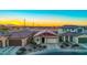 Aerial view of a house and neighborhood at sunset at 5932 S 26Th Ave, Phoenix, AZ 85041