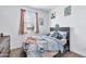 Charming bedroom with full bed and window with blinds at 5932 S 26Th Ave, Phoenix, AZ 85041