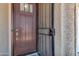 Modern dark brown front door with a screen door at 5932 S 26Th Ave, Phoenix, AZ 85041