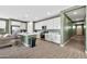 Modern kitchen with white cabinets and stainless steel appliances at 5932 S 26Th Ave, Phoenix, AZ 85041