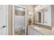Inviting bathroom with granite counters, single sink vanity, framed mirror, and tub/shower combo at 6178 W Quail Ave, Glendale, AZ 85308