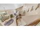 Elevated view of a foyer featuring a stairway and high ceilings with bright decor at 6178 W Quail Ave, Glendale, AZ 85308