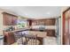 Spacious kitchen with stainless steel appliances and granite countertops at 6178 W Quail Ave, Glendale, AZ 85308