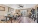 Cozy living room with wood floors, ample seating, and natural light at 6178 W Quail Ave, Glendale, AZ 85308