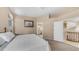 Comfortable main bedroom with neutral tones and access to a private ensuite bathroom at 6178 W Quail Ave, Glendale, AZ 85308