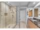 Large bathroom with walk-in shower and elegant vanity at 7117 E Rancho Vista Dr # 3006, Scottsdale, AZ 85251