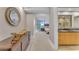 View of bathroom with modern double vanity and access to bedroom at 7117 E Rancho Vista Dr # 3006, Scottsdale, AZ 85251