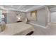 Spacious bedroom with large mirror and comfortable seating at 7117 E Rancho Vista Dr # 3006, Scottsdale, AZ 85251