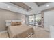 Bedroom with sliding glass doors leading to balcony at 7117 E Rancho Vista Dr # 3006, Scottsdale, AZ 85251