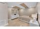 Modern bedroom with white dresser and ensuite bathroom at 7117 E Rancho Vista Dr # 3006, Scottsdale, AZ 85251