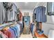 Large walk-in closet with ample shelving and hanging space at 7117 E Rancho Vista Dr # 3006, Scottsdale, AZ 85251