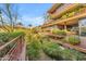 Building courtyard with lush landscaping and trees at 7117 E Rancho Vista Dr # 3006, Scottsdale, AZ 85251