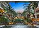 Luxurious condo complex with a serene central courtyard featuring lush landscaping and water features at 7117 E Rancho Vista Dr # 3006, Scottsdale, AZ 85251