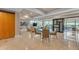 Open concept dining area with modern glass table and chairs at 7117 E Rancho Vista Dr # 3006, Scottsdale, AZ 85251