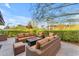 Relaxing patio with wicker furniture and fire pit at 7117 E Rancho Vista Dr # 3006, Scottsdale, AZ 85251