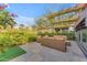 Private patio featuring a tiled surface and greenery at 7117 E Rancho Vista Dr # 3006, Scottsdale, AZ 85251