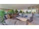 Relaxing patio with wicker furniture and potted plants at 7117 E Rancho Vista Dr # 3006, Scottsdale, AZ 85251