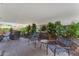 Outdoor patio with modern chairs and small table at 7117 E Rancho Vista Dr # 3006, Scottsdale, AZ 85251
