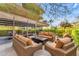 Outdoor patio with seating area and lush greenery at 7117 E Rancho Vista Dr # 3006, Scottsdale, AZ 85251
