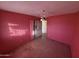 Pink bedroom with a window, ceiling fan, and closet at 7605 N 45Th Dr, Glendale, AZ 85301