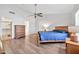 Main bedroom with wood flooring and ample closet space at 8832 W Bloomfield Rd, Peoria, AZ 85381