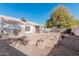Large backyard with gravel and rock landscaping at 9041 W Virginia Ave, Phoenix, AZ 85037