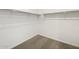 Spacious walk-in closet with carpet at 9102 N 174Th Ln, Waddell, AZ 85355