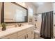 Clean bathroom with white cabinets and a walk-in shower at 9127 E Lynwood St, Mesa, AZ 85207