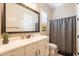 Clean bathroom with white cabinets and a walk-in shower at 9127 E Lynwood St, Mesa, AZ 85207