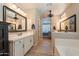 Spa-like bathroom with soaking tub and separate shower at 9127 E Lynwood St, Mesa, AZ 85207