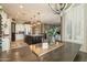 Spacious dining area with a large table and bench seating, overlooking the kitchen at 9127 E Lynwood St, Mesa, AZ 85207