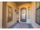 Front entry with decorative door and sidelights at 9127 E Lynwood St, Mesa, AZ 85207