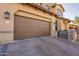 Three-car garage with paver driveway at 9127 E Lynwood St, Mesa, AZ 85207