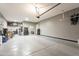 Large garage with ample storage space and overhead storage at 9127 E Lynwood St, Mesa, AZ 85207