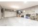 Two-car garage with additional storage and room for bikes at 9127 E Lynwood St, Mesa, AZ 85207