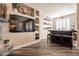 Home bar with built-in shelving and seating at 9127 E Lynwood St, Mesa, AZ 85207
